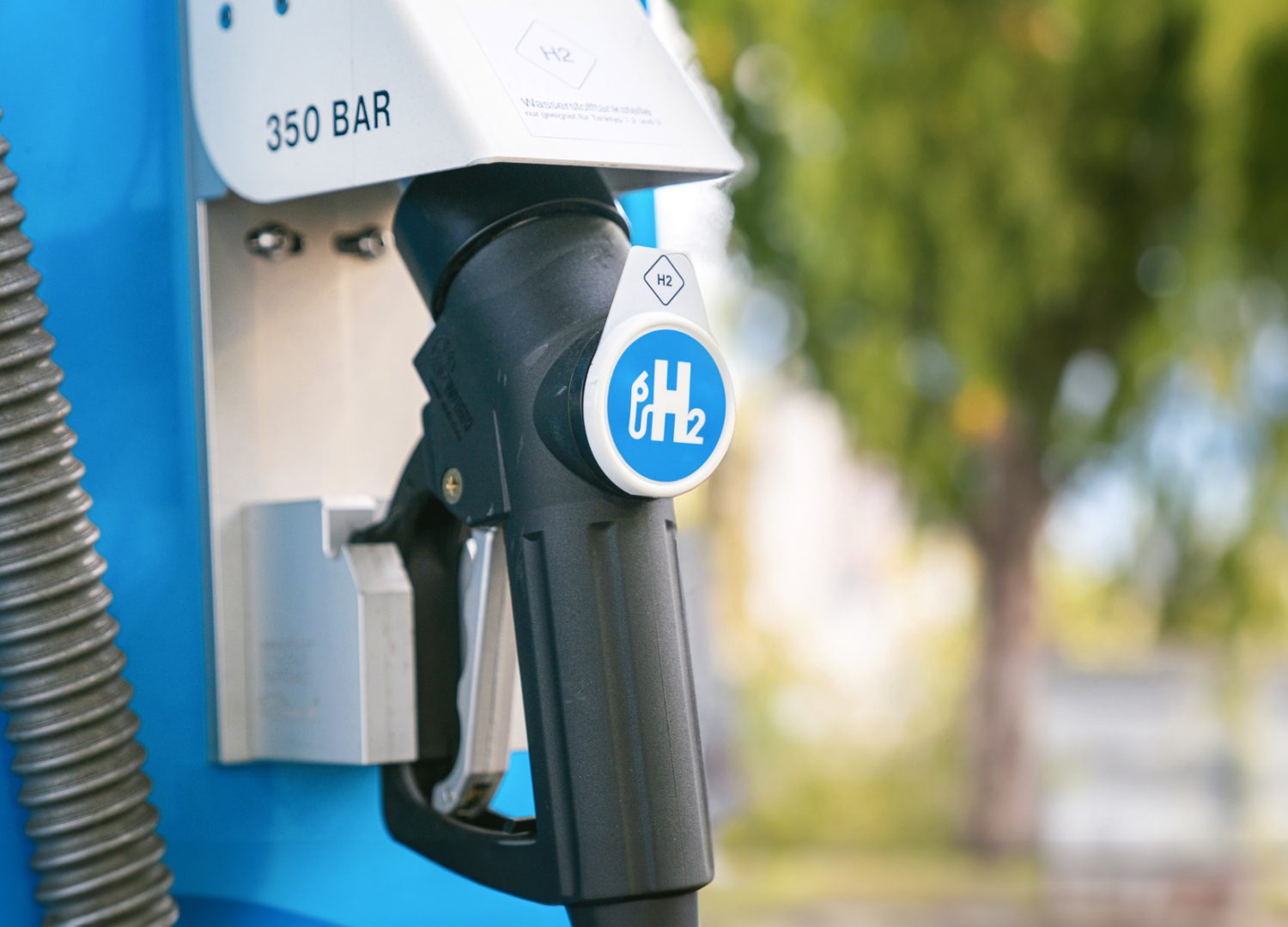 Aachen / Germany - January 31 2020: hydrogen logo on gas stations fuel dispenser. h2 combustion engine for emission free eco friendly transport.